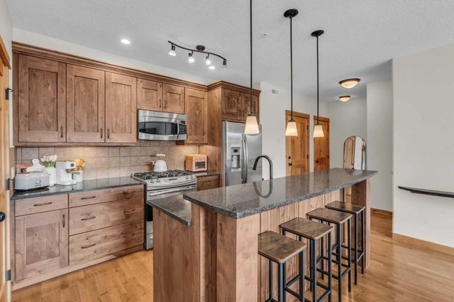 201 - 2100B Stewart Creek Dr, Condo with 2 bedrooms, 3 bathrooms and 1 parking in Canmore AB | Image 17
