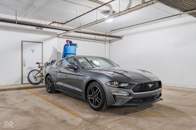 You'll have your own private parking spot in the heated garage below the building as well as the storage closet behind it | Image 30