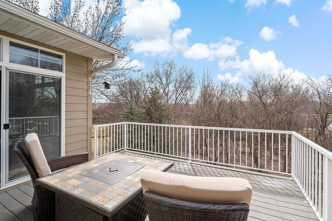 A perfect start to your day - the deck with access from the sunroom, and the primary suite. | Image 10