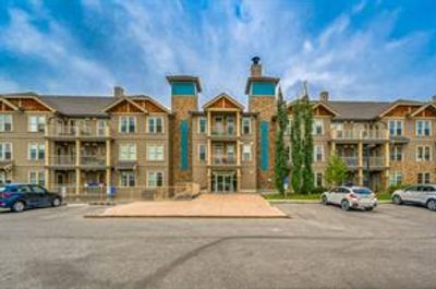 221 - 207 Sunset Dr, Condo with 2 bedrooms, 2 bathrooms and 1 parking in Cochrane AB | Image 1