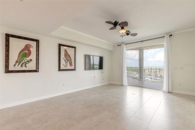 living room with sliders to private balcony | Image 3