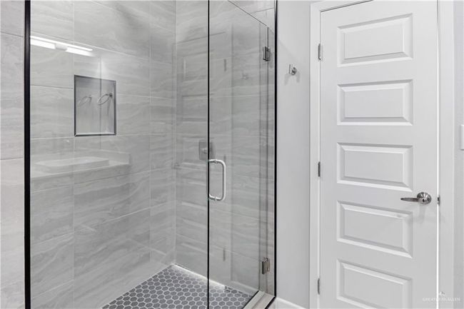 Full bath featuring a stall shower | Image 18