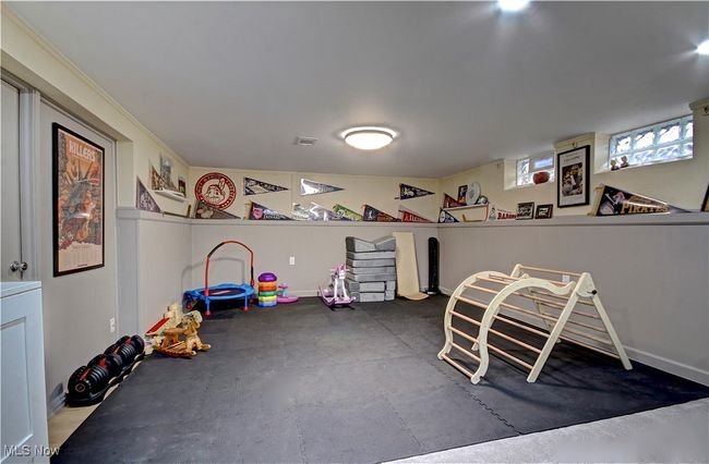 Recreation room featuring baseboards | Image 32