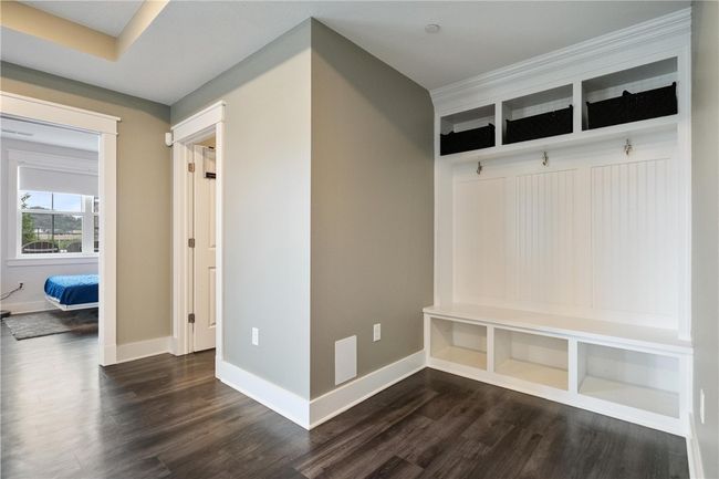 Finished Lower Level Mud Room area with cubbies. LVT flooring makes easy clean up! | Image 38