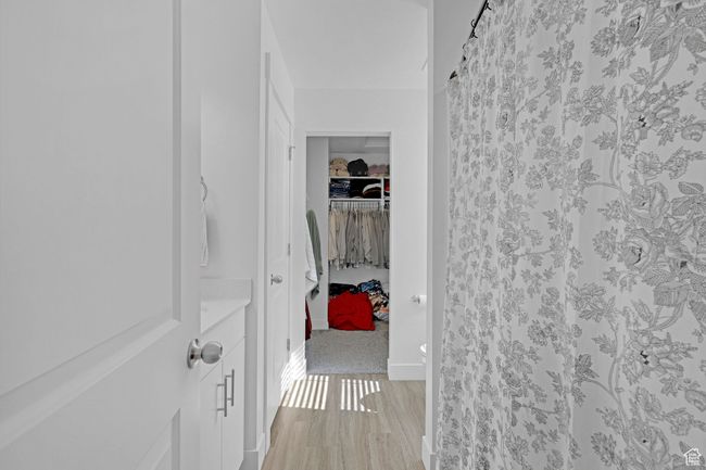 Hallway featuring light wood-type flooring | Image 15