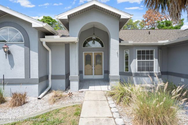 11242 Riddle Dr, House other with 3 bedrooms, 3 bathrooms and null parking in SPRING HILL FL | Image 4