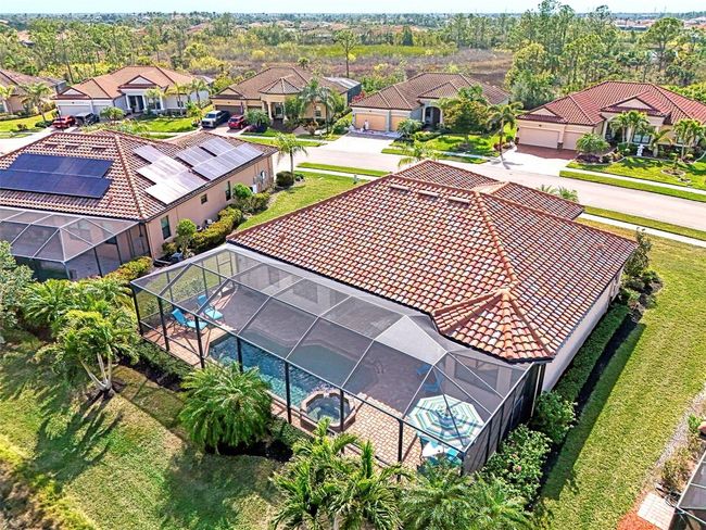 Aerial View of Screened Lanai/Pool/Spa & Brick Paver Decking | Image 68