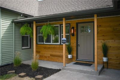 Doorway to property with a porch | Image 2