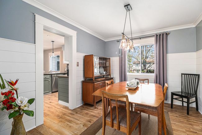 Revamped dining room w/ shiplap & coved ceilings. | Image 4