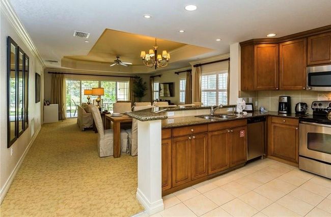 APT-104 - 7660 Whisper Way, Condo with 3 bedrooms, 3 bathrooms and null parking in REUNION FL | Image 4