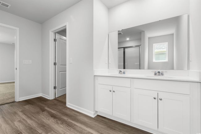 Bathroom with vanity, wood-type flooring, and walk in shower | Image 24