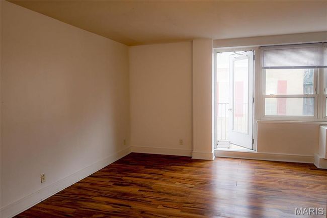 Your new home has an open floor plan and through that door is your balcony!! | Image 4