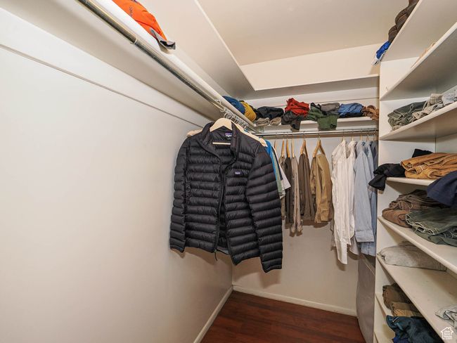 Walk in closet with wood finished floors | Image 21