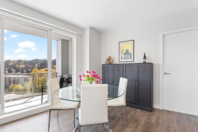 Dining room featuring wood finished floors | Image 9