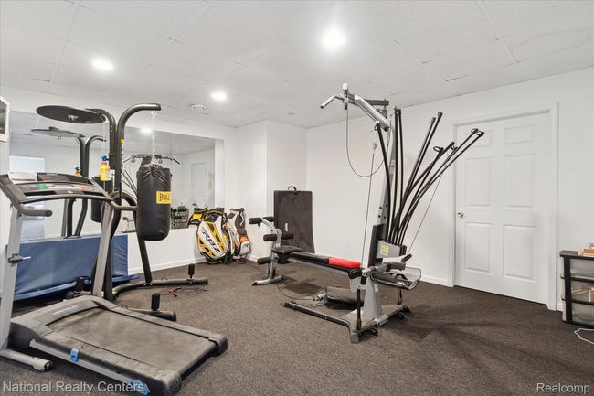 5th bedroom currently used as workout room | Image 29