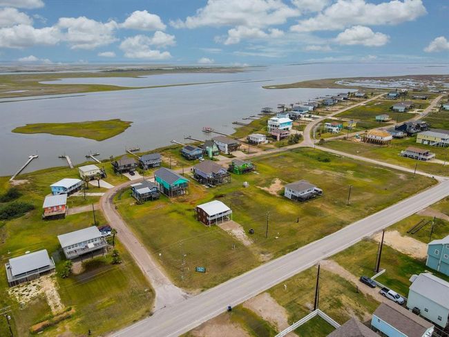 This photo showcases the San Luis Beach Subdivision a coastal neighborhood offering Gulf and Bay views and direct access to the water with community boat ramp. | Image 34