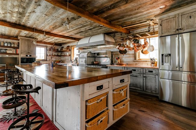 Gourmet Kitchen with copper & chestnut counter tops. | Image 16