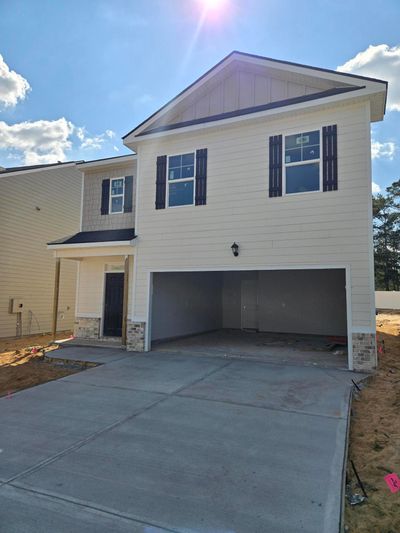 Photo of actual home under construction. | Image 2