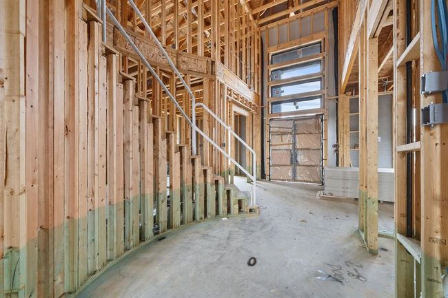 From every angle, this space invites you in open double doors and a sweeping staircase set the tone for home. | Image 12
