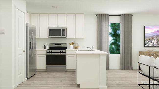 Kitchen with stainless steel appliances, light wood-type flooring, white cabinets, and light countertops | Image 23