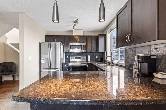 8 - 122 Village Heights Sw, Home with 2 bedrooms, 1 bathrooms and 2 parking in Calgary AB | Image 22