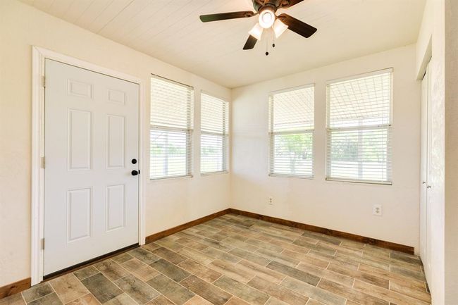 First Floor Bedroom that is Virtually Staged as a Home Office in our photos is approximately 11'10" x 11'7". Buyer to verify all room measurements. | Image 32