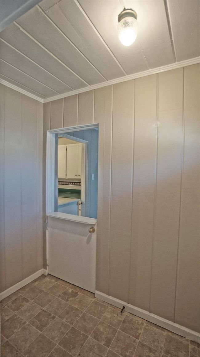 Unfurnished room featuring ornamental molding | Image 4