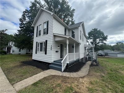 View of front of house featuring a front lawn | Image 1