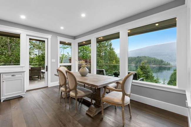 Sunroom featuring baseboards, healthy amount of natural light, hardwood / wood-style floors, and recessed lighting | Image 15