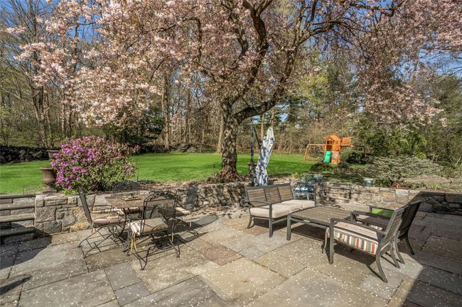 View of patio with a playset | Image 17