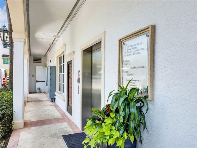 Hall featuring elevator | Image 30