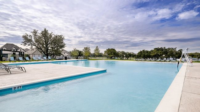 Community pool featuring a patio | Image 4