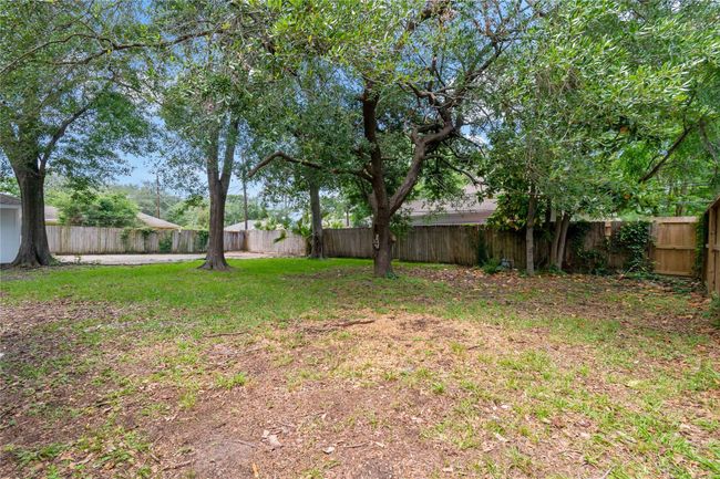 Another view of the nice size backyard. | Image 5