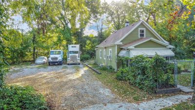 View of side of home with cooling unit | Image 2