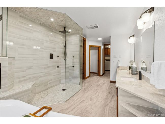 9303 Dauntless Way, House other with 4 bedrooms, 4 bathrooms and null parking in Conifer CO | Image 33