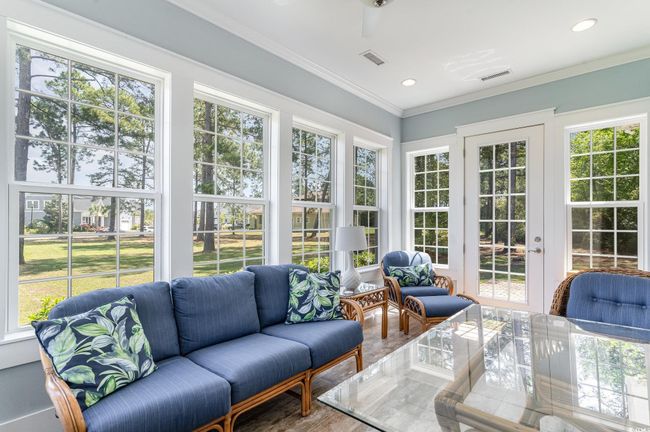 Sunroom / solarium with ornamental molding, visible vents, and recessed lighting | Image 23
