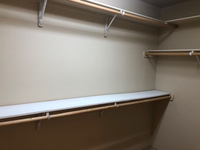 View of walk in closet | Image 9