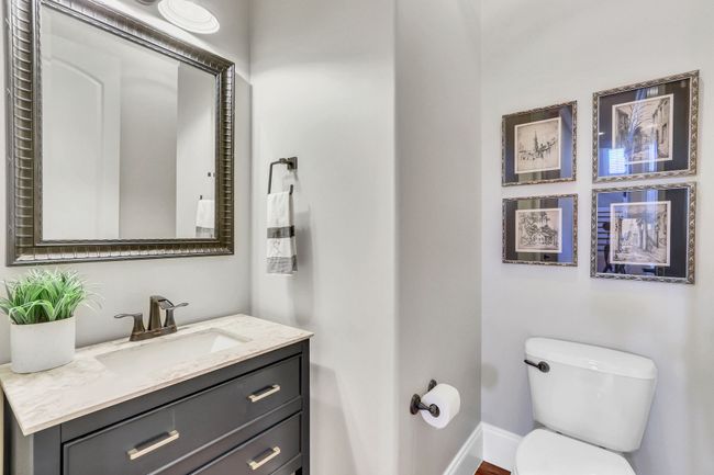 This beautiful, updated half bath serves guests on the main level. | Image 36