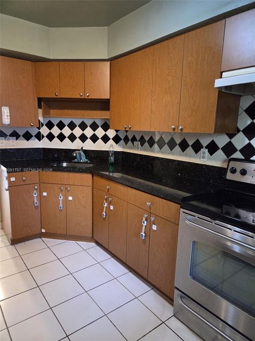 102-9101 W Sample Rd, Coral Springs, FL, 33065-1629 | Card Image