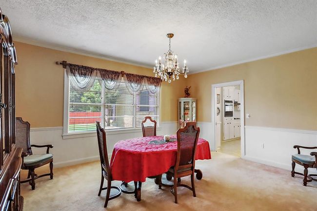 Access from the formal dining room straight into the kitchen. | Image 12