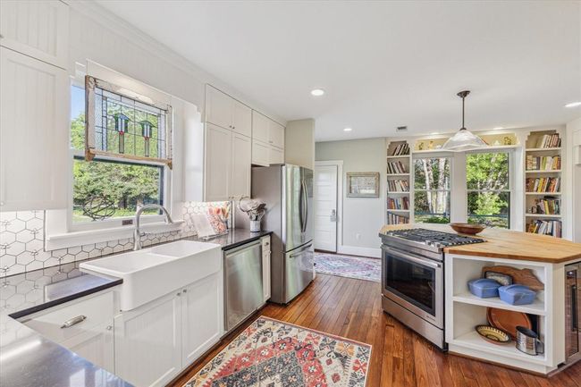 The lovely, updated kitchen area (14 x 15 SQ FT). | Image 8