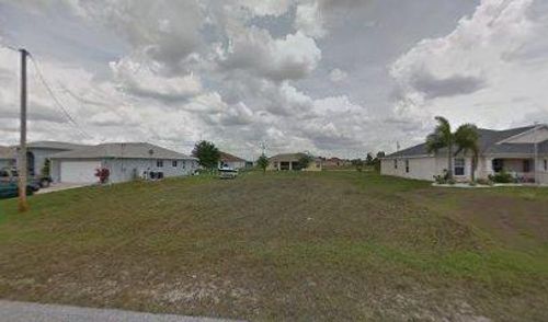 409 Nw 17th Pl, Cape Coral, FL, 33993-7616 | Card Image