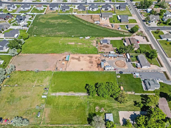 Aerial view of property and surrounding area with nearby suburban area | Image 50