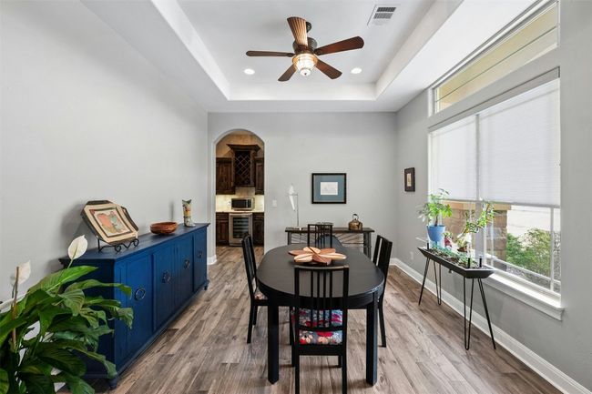 The formal dining space is large enough for entertaining or could also be used as a second living room. | Image 11