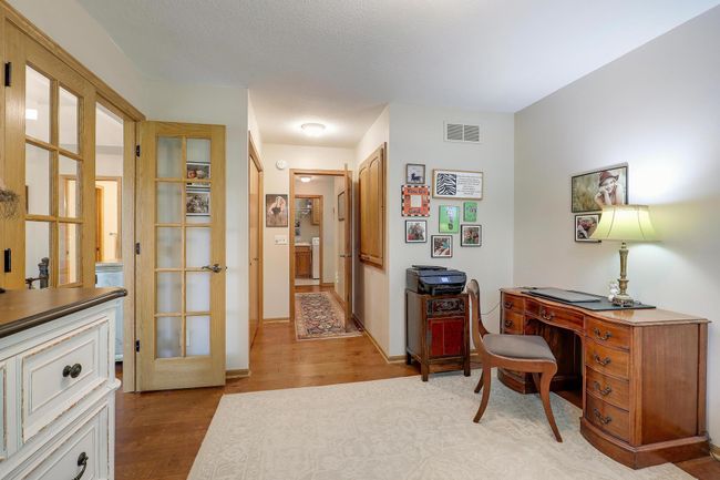 2nd bedroom has large closet and extended storage over staircase. | Image 28