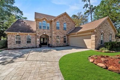 Welcome home to 19027 Match Play Drive, located in the highly sought after Walden community on Lake Houston. | Image 1