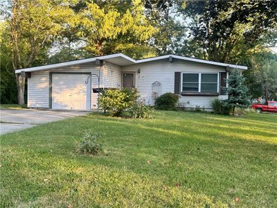 Single story home with a front yard | Image 1