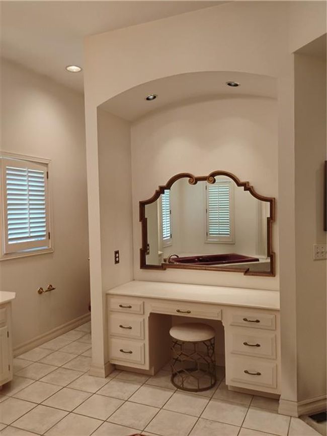 Bathroom featuring plenty of natural light, vanity, recessed lighting, and tile patterned floors | Image 50