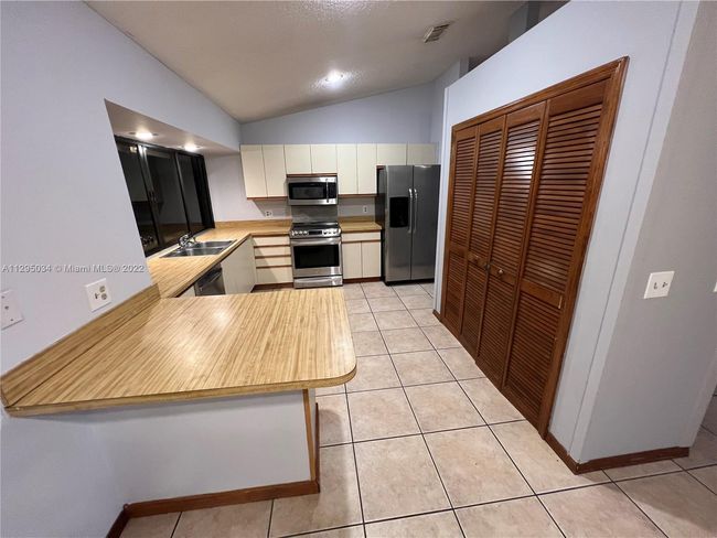 1921 Sw Hickock Ter, House other with 3 bedrooms, 2 bathrooms and null parking in Port St. Lucie FL | Image 6