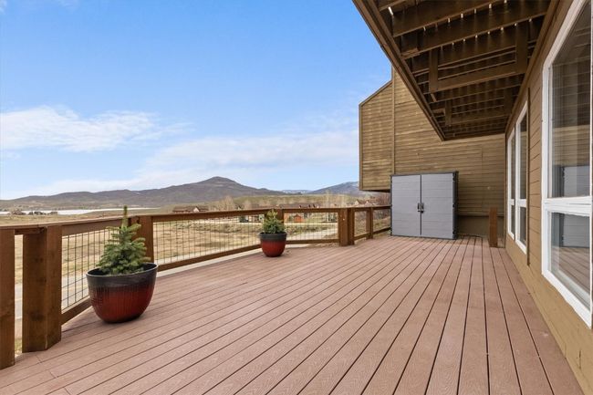 Deck with views on lower level, includes storage cabinet | Image 22